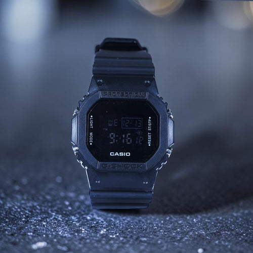 Casio G Shock Watch (featuring a matte black finish and a negative digital display)
