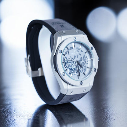 Hublot watch (abstract patterns and a grey strap)